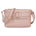 Front view of dusty mauve-pink faux leather crossbody bag with embossed geometric texture, decorative gold-tone buckle, stud accents, front zipper pocket, and adjustable strap on white