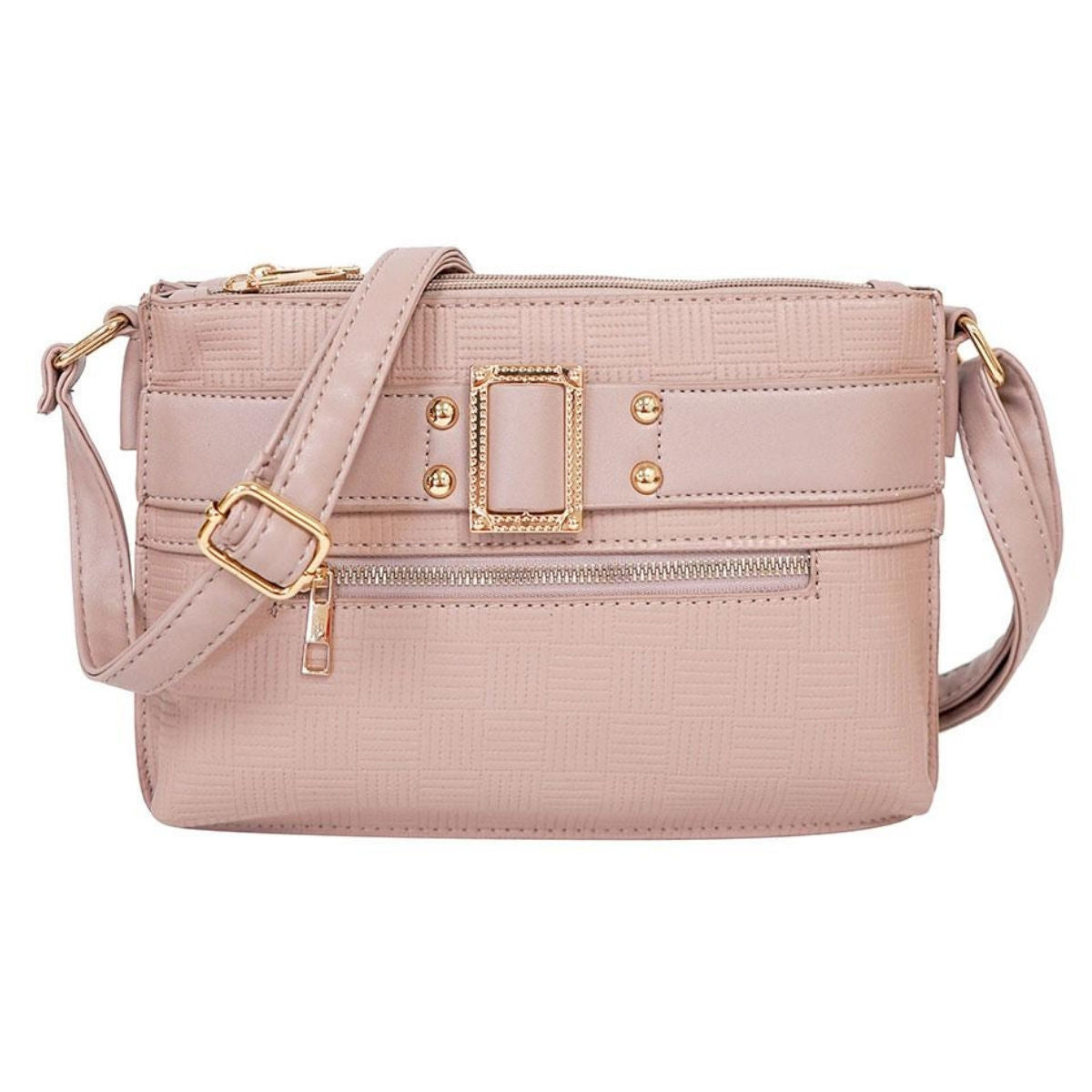 Front view of dusty mauve-pink faux leather crossbody bag with embossed geometric texture, decorative gold-tone buckle, stud accents, front zipper pocket, and adjustable strap on white