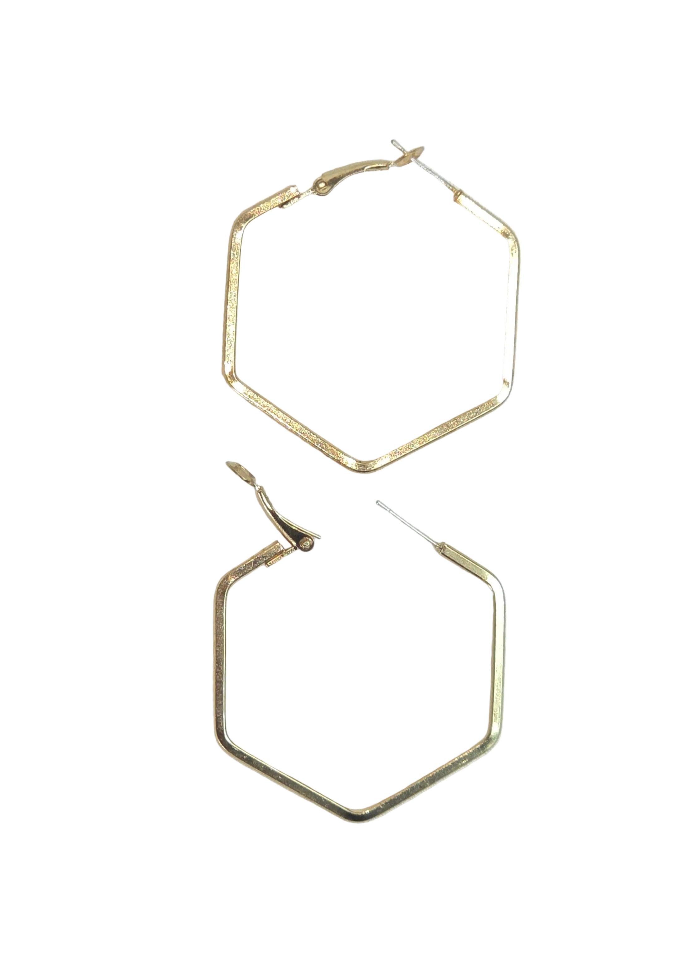 A pair of gold-toned hexagonal hoop earrings with post-back closures, displayed on a light off-white background.