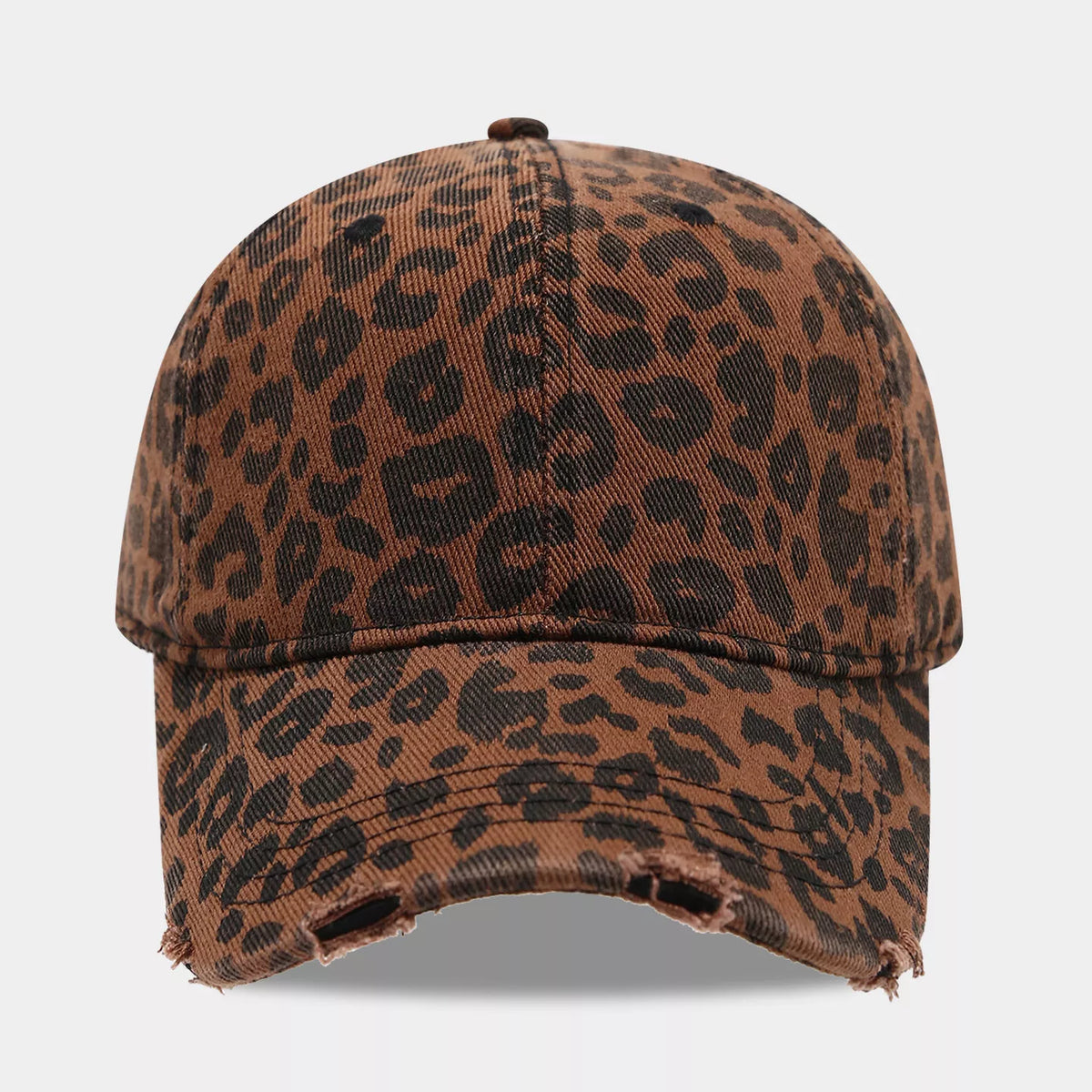 Front view of a brown cotton baseball cap with black leopard print, a covered top button, and a distressed curved brim