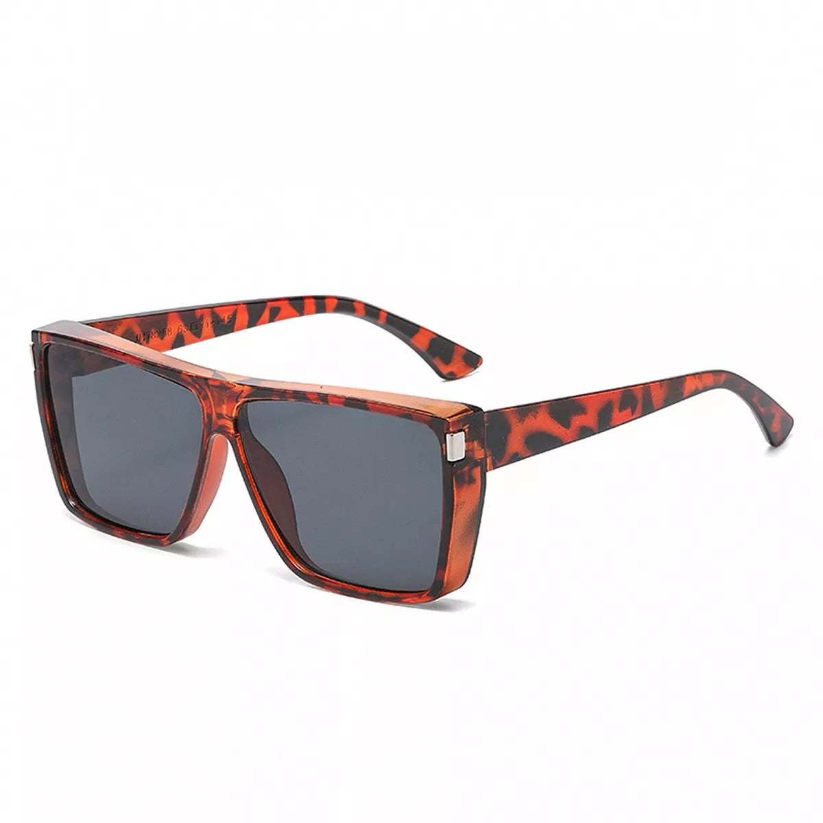 Oversized square sunglasses with reddish-brown tortoiseshell-pattern frames, dark gray lenses, and silver-tone corner accents on a white background