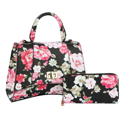 Black floral top-handle satchel with pink and white flowers, gold-tone front clasp, and matching floral zip-around wallet on a white background