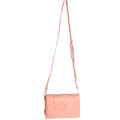 Blush quilted vegan leather boxy crossbody bag with flap-and-snap closure and detachable shoulder strap