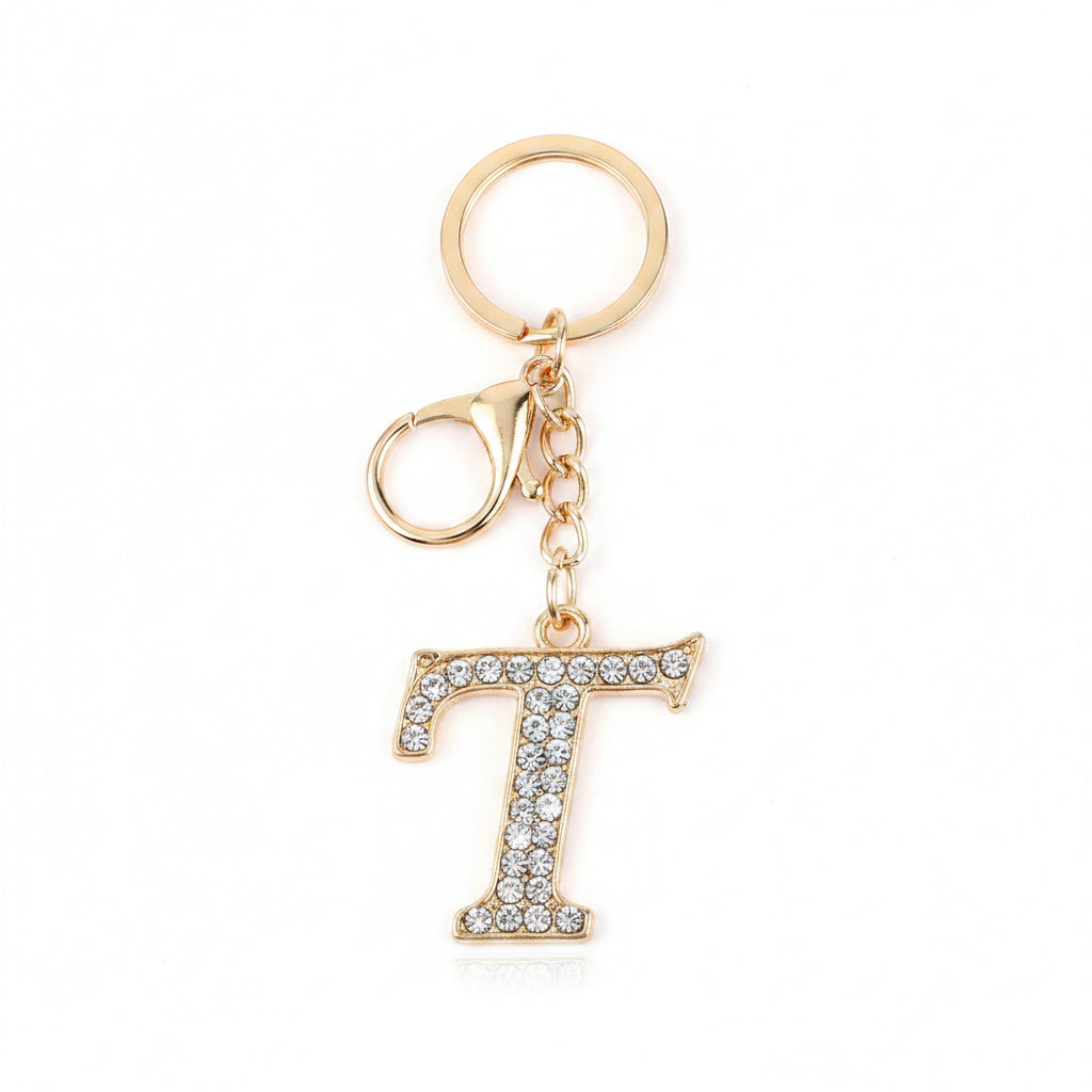 Rhinestone pavé initial letter T keychain bag charm with clear crystal rhinestone pavé block T pendant, gold-tone lobster clasp and key ring, white background