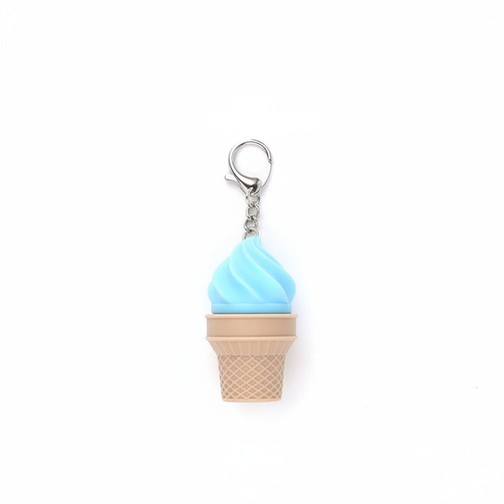 Light blue soft-serve swirl plastic ice cream cone fidget clicker keychain with tan waffle cone base, silver chain, and silver lobster clasp clip, white background