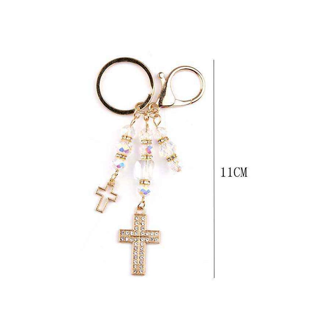 Double rhinestone cross charm drop bag charm keychain shown with 11cm length measurement reference, gold-tone hardware with iridescent AB crystal beads, open cross and pavé rhinestone cross pendants, gold key ring and lobster clasp