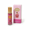 110ml mini eau de parfum roll-on bottle with gold cap next to pink and white vertical stripe gift box reading Berry On Top Give Me Gourmand, strawberry ice cream sundae illustration, Eau de Parfum Natural 10ml label, white background