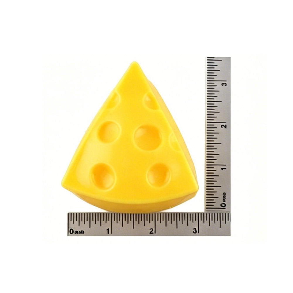 Yellow cheese wedge squishy stress relief toy shown next to ruler measuring approximately 3 inches wide and 3 inches tall, white background