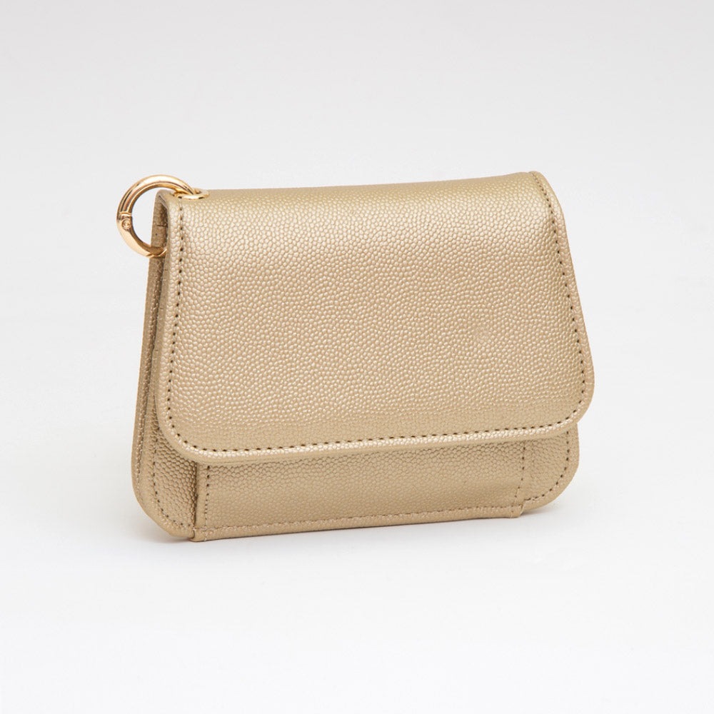 Women's gold metallic pebble leather compact card wallet with snap flap closure, exterior coin pocket, and gold ring hardware — angled view on white background