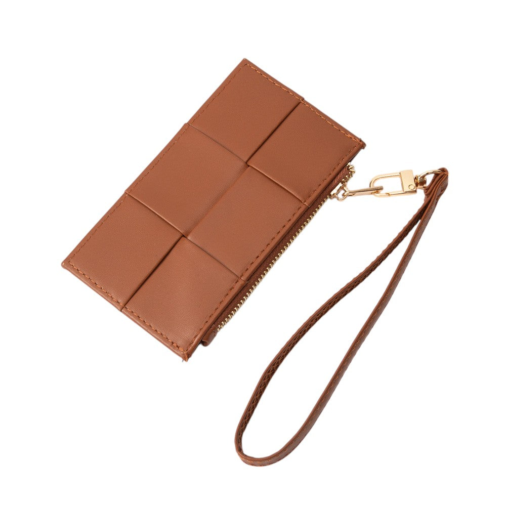 Brown leather wallet with a strap on a white background