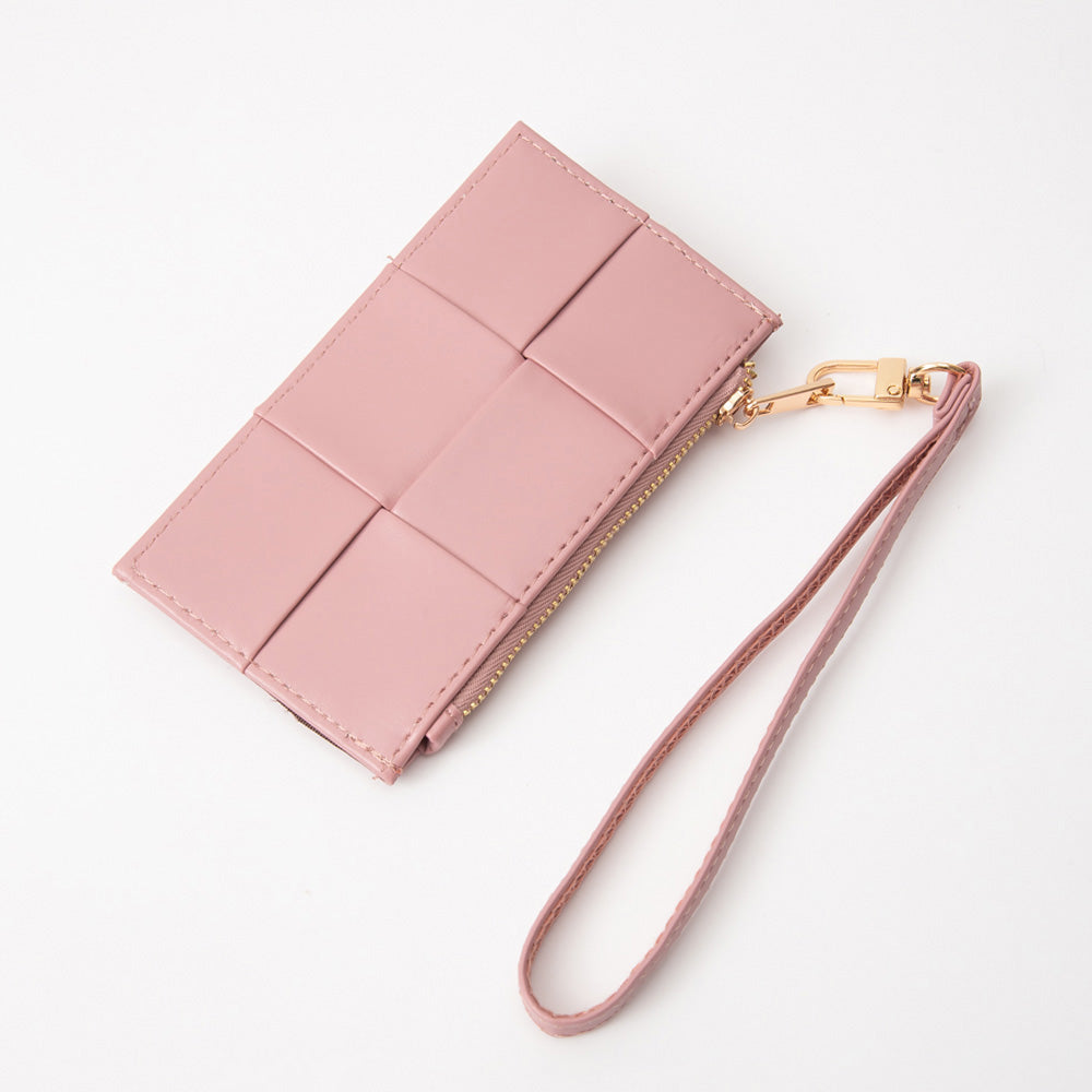 Pink wallet with a strap on a white background