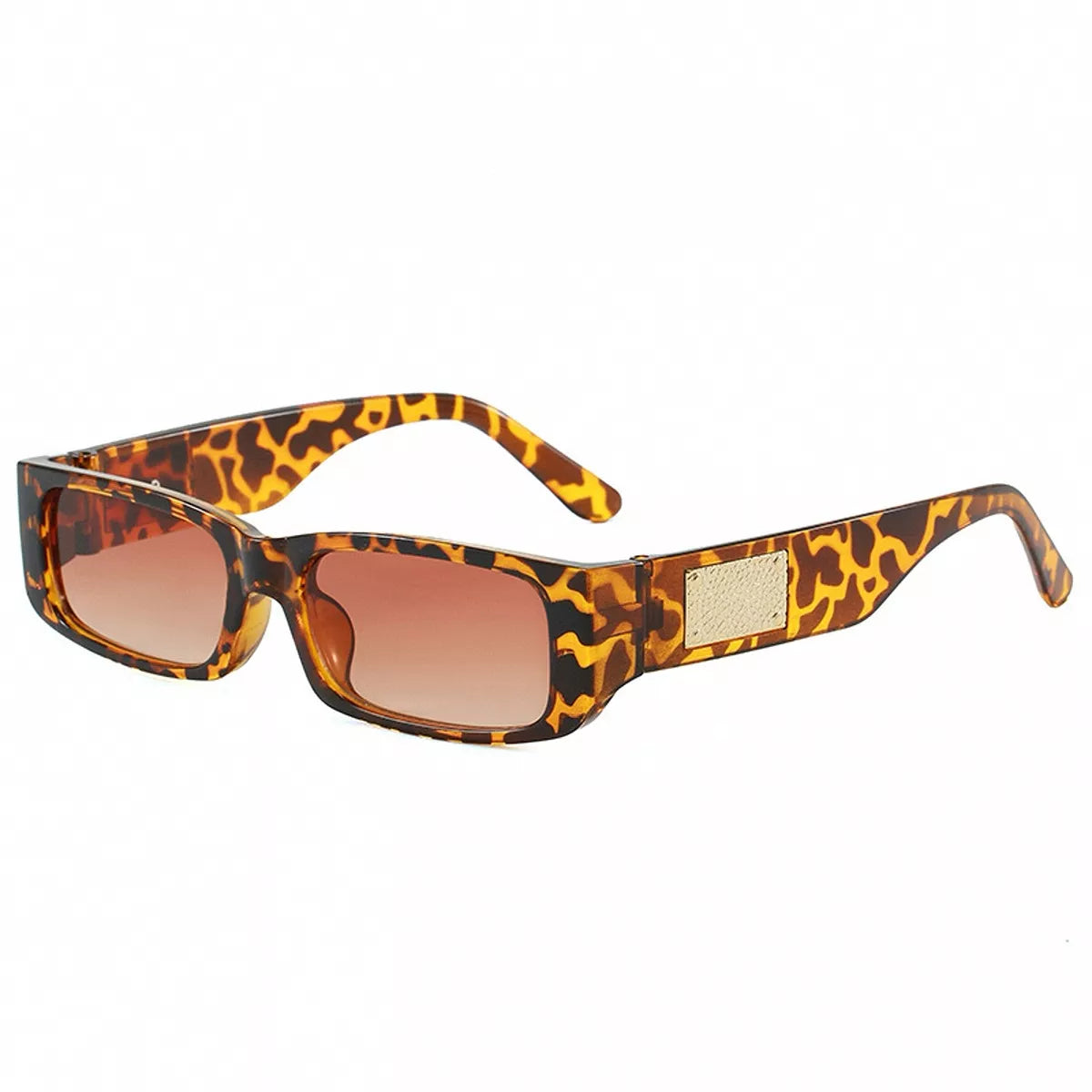Leopard-pattern rectangular sunglasses with brown gradient lenses, wide temples, and a textured gold-tone accent on a white background