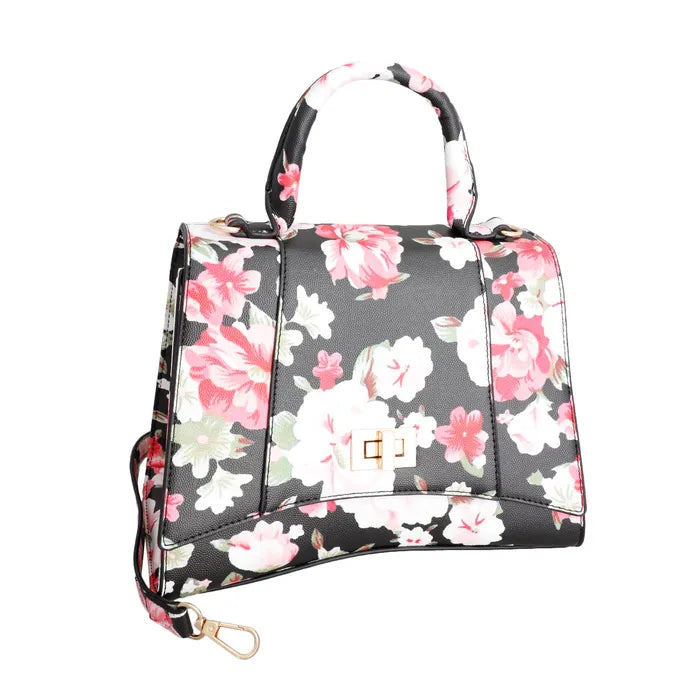  Black faux-leather-look floral satchel shown alone with a structured top handle, front flap, gold-tone clasp, and shoulder strap hardware on a white background