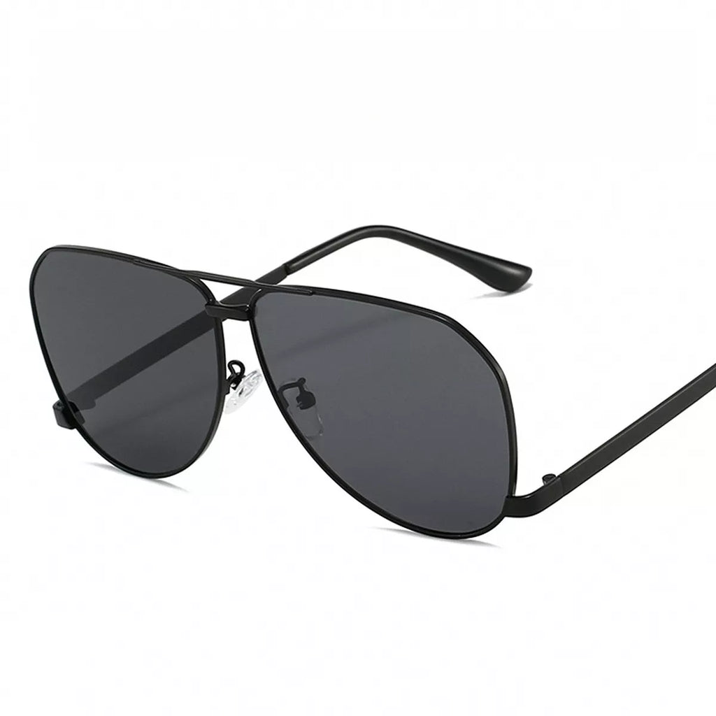 Black metal aviator sunglasses with dark gray teardrop lenses, a double bridge, clear nose pads, and curved black temple tips on a white background