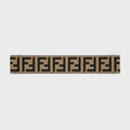Brown wide elastic headband with geometric interlocking print pattern on white background