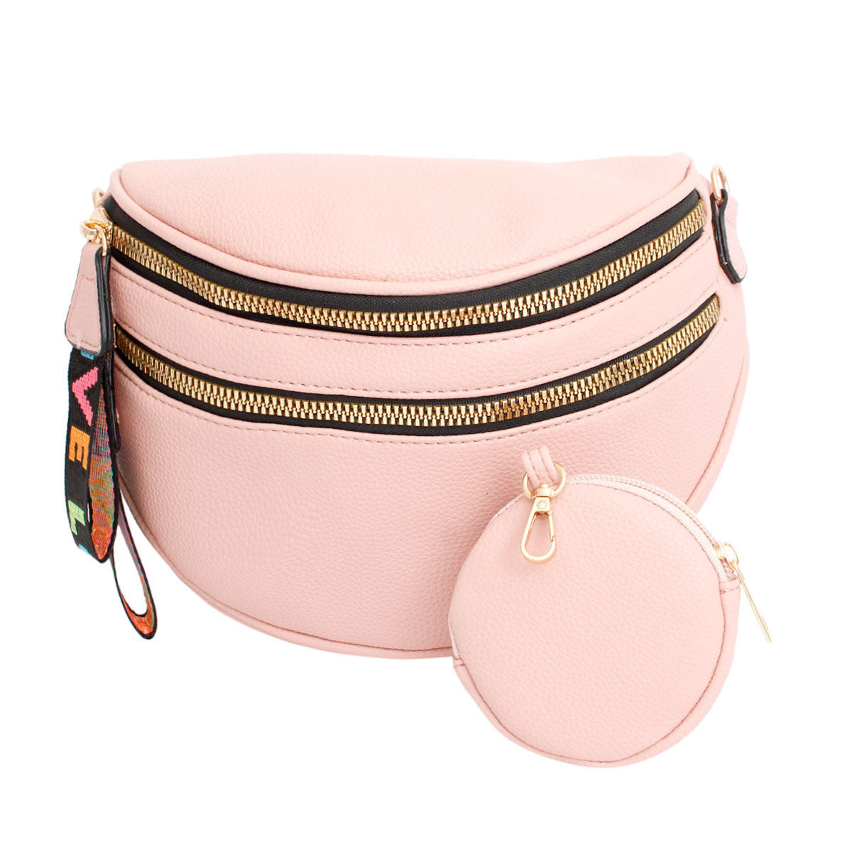 Front view of a blush pink pebbled vegan leather sling belt bag with two gold zippers, a rainbow woven LOVE pull tab on the left, and a matching round pink zip coin purse with a gold clip resting in front