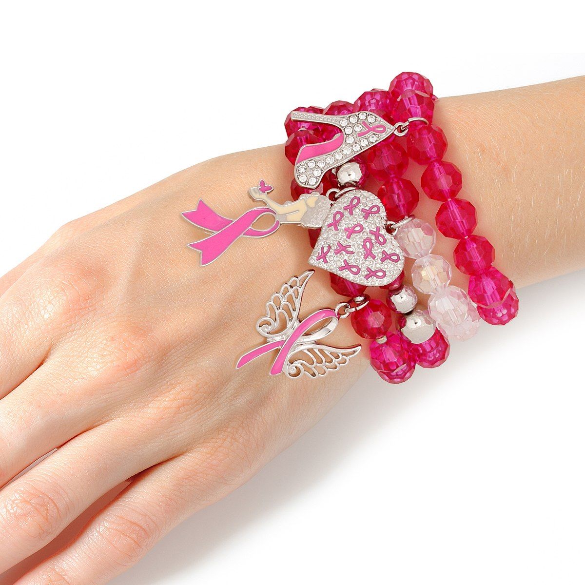 Fuchsia glass bead charm bracelet set stacked on a woman's wrist, showing angel wings, rhinestone pink ribbon heart, rhinestone high heel and woman silhouette charms
