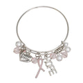 Silver-tone wire charm bangle with light pink ribbon, HOPE charm, Special Sister heart charm, white pearls and faceted light pink beads on white background