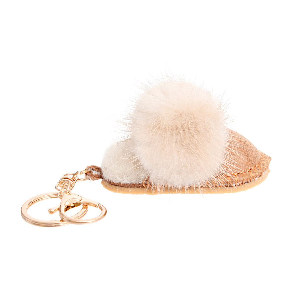 Light brown vegan suede mini mule slide bag charm keychain with cream faux fur pom-pom, gold split keyring, and gold lobster clasp