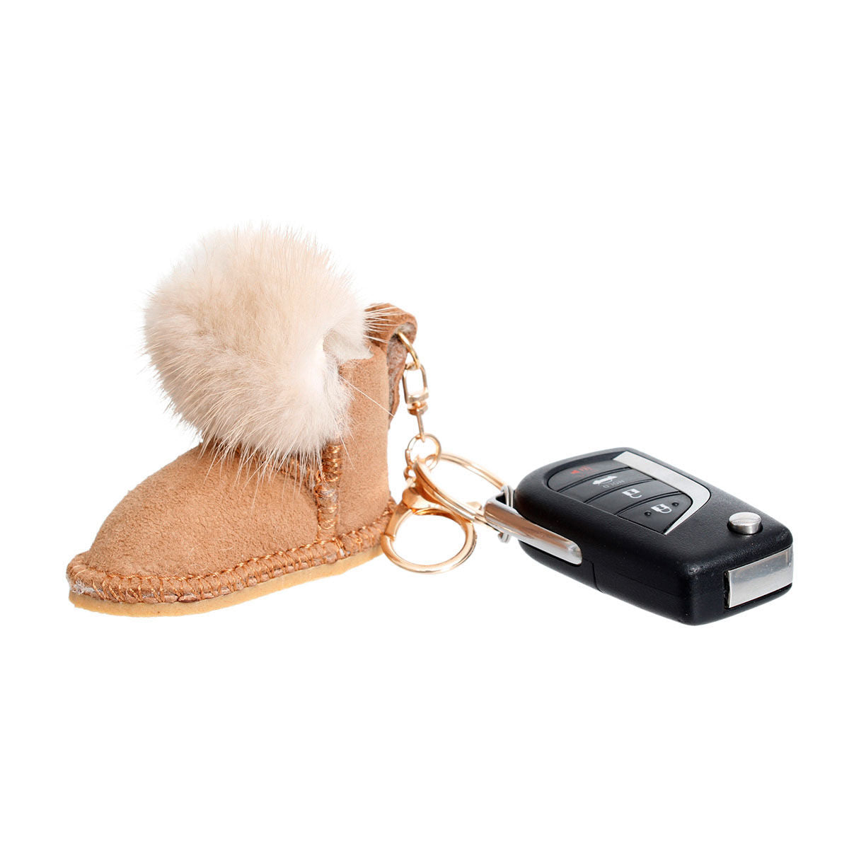 Light brown vegan suede mini boot bag charm keychain with white faux fur pom-pom cuff, stitched sole detail, gold keyring, and lobster clasp