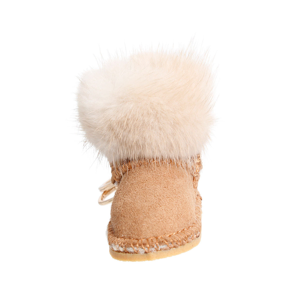 Light brown vegan suede mini boot bag charm keychain with white faux fur pom-pom cuff, stitched sole detail, gold keyring, and lobster clasp