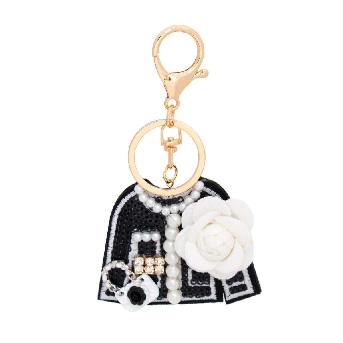 Black felt tweed-style mini jacket bag charm keychain with white camellia flower, pearl strand detail, rhinestone accents, mini handbag charm, and gold lobster clasp
