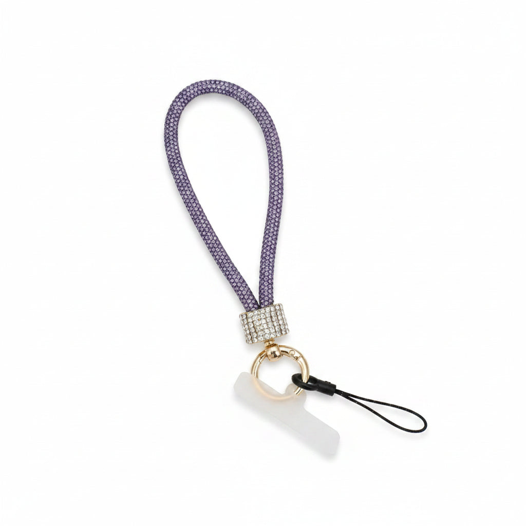 Purple rhinestone-encrusted rope phone wrist strap on white background showing 10-inch loop, clear rhinestone barrel wrap, round gold carabiner clasp, and black cord loop