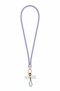 Purple rhinestone-encrusted rope phone lanyard laid flat on white background showing full 32-inch loop, clear rhinestone barrel wrap, round gold carabiner clasp, black cord loop, and clear rectangular plastic card insert