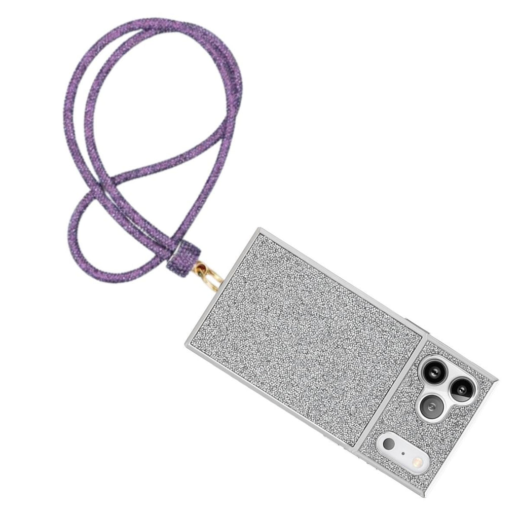Purple rhinestone rope phone lanyard attached to full-coverage silver micro-rhinestone hard-shell iPhone case with gold carabiner clasp, displayed diagonally on white background showing triple rear camera cutout