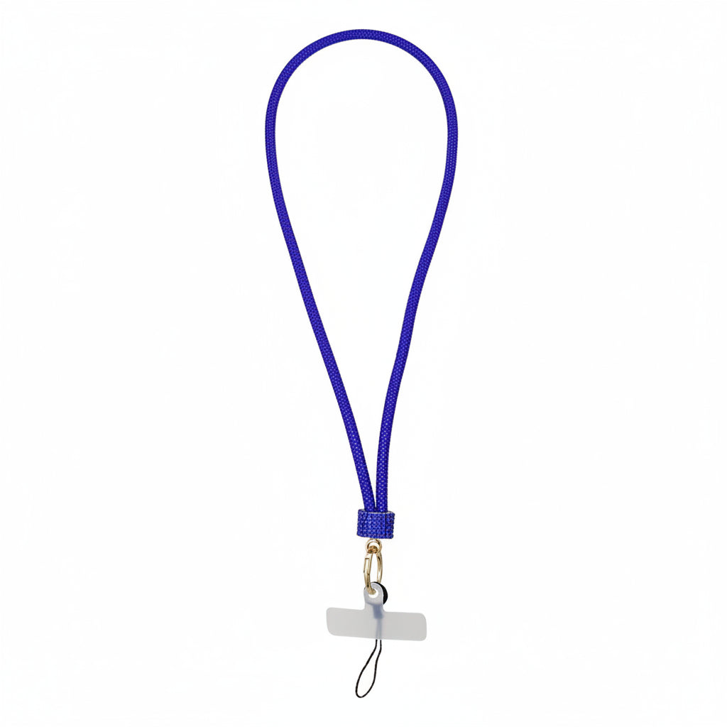 Royal blue rhinestone-encrusted rope phone lanyard laid flat on white background showing full 32-inch loop, blue rhinestone barrel wrap, round gold lobster clasp, black jump ring, and clear rectangular plastic card insert