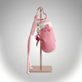 Full product view of pink boxing glove keychain with breast cancer ribbon, silver-tone survivor charm, fuchsia crystal, heart clip, and long cord