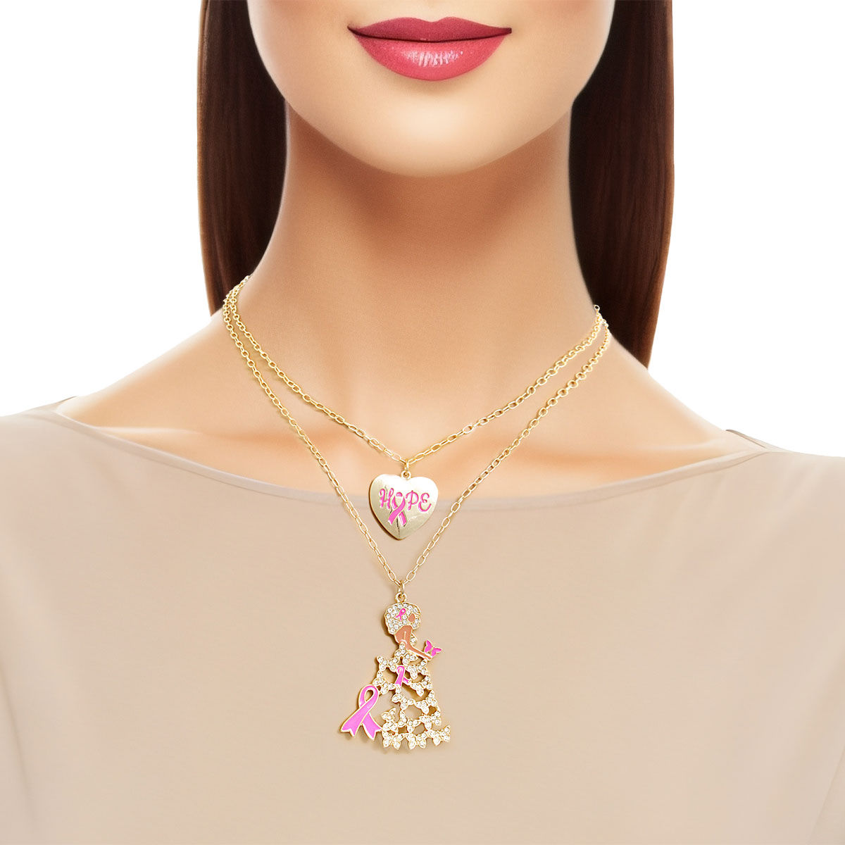 Woman wearing a breast cancer awareness gold layered necklace set with a pink ribbon HOPE heart pendant and a rhinestone butterfly gown lady pendant