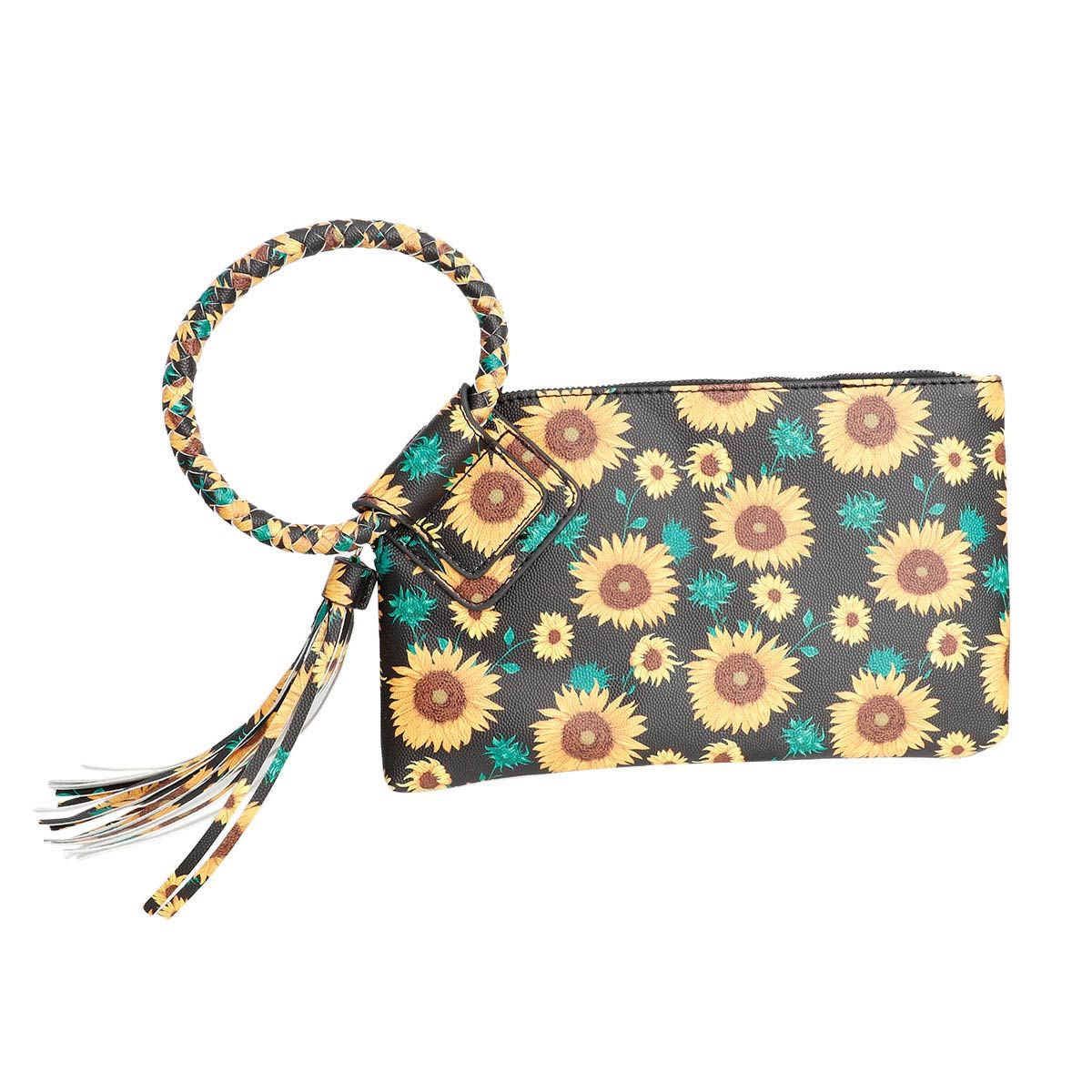 Front view of black sunflower-print faux leather clutch with yellow flowers, green foliage, top zipper, wrapped bangle handle, and matching tassel hanging at the left on a white background