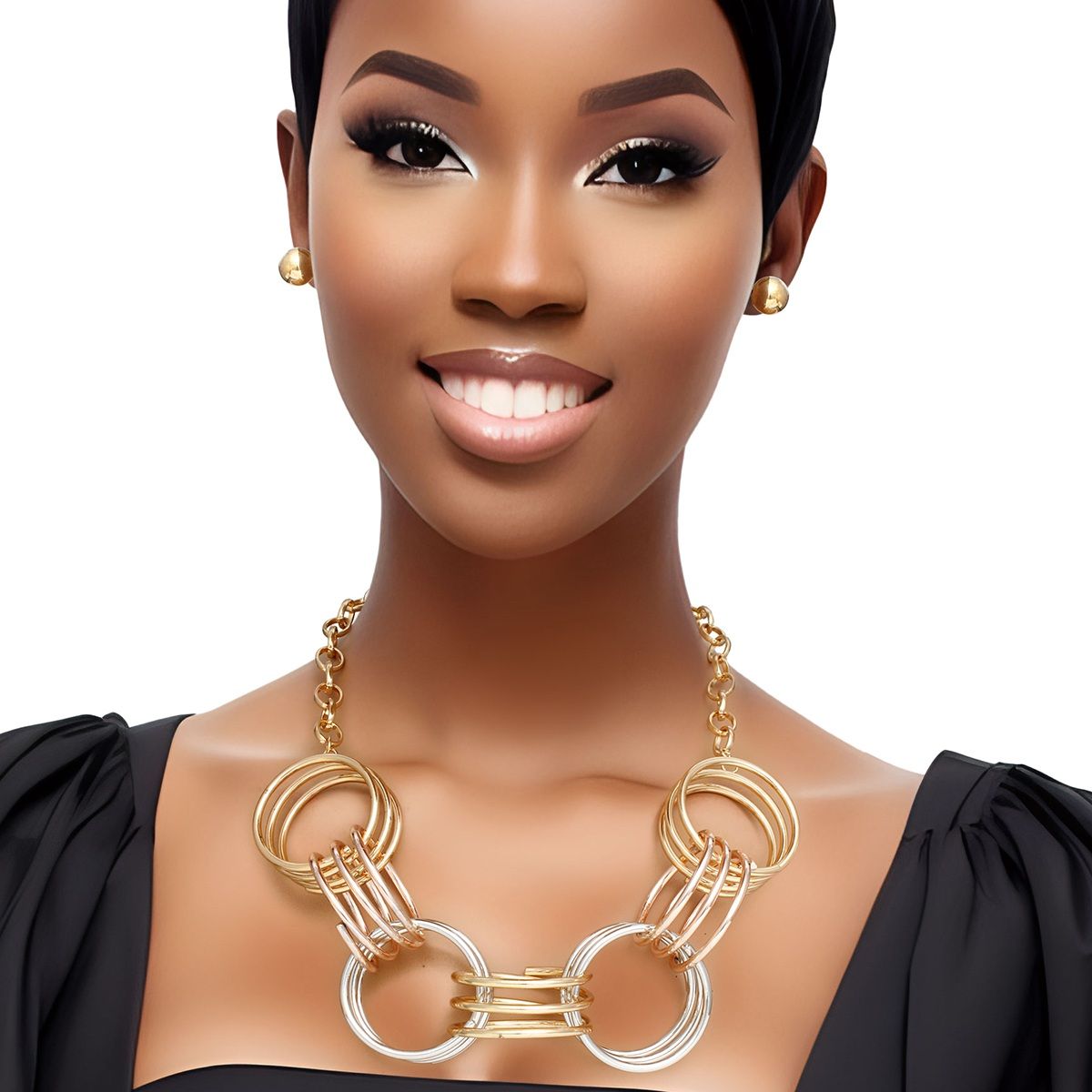 An AI-rendered woman with dark skin, short black hair, bold eye makeup, and a warm smile poses against a white background wearing a black puff-sleeve top. She wears a chunky mixed metal multi-wire open ring collar necklace in gold, rose gold, and silver tone at the collarbone, paired with small gold tone ball stud earrings.
