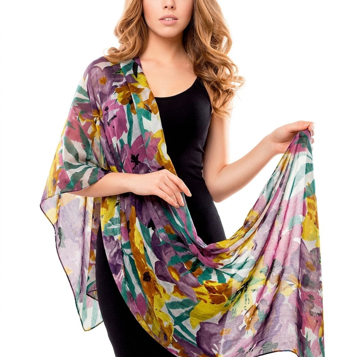 Model in a black sleeveless outfit wearing a purple-and-yellow floral scarf over one shoulder and holding the opposite end against a white background
