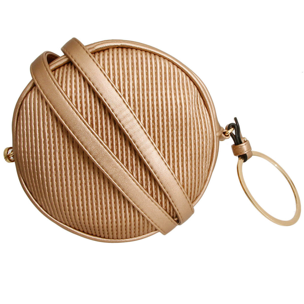 Gold vegan leather ribbed circle crossbody wristlet with gold metal circle detailing, zipper closure, and detachable matching shoulder strap
