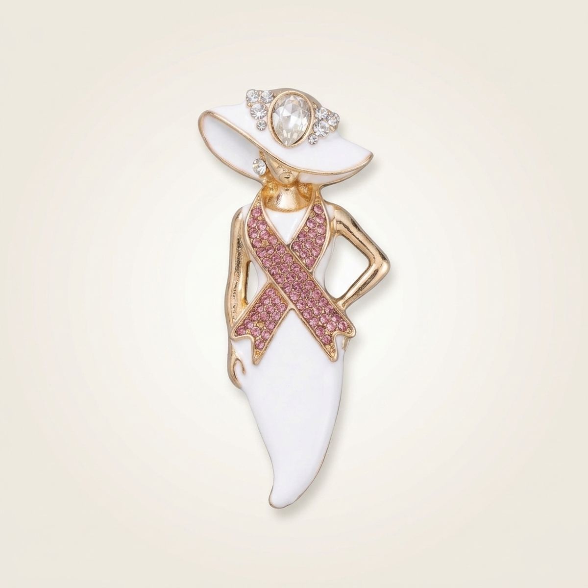 Pink ribbon white hat lady gold brooch pin with clear rhinestone hat trim and hand-on-hip pose, on cream background