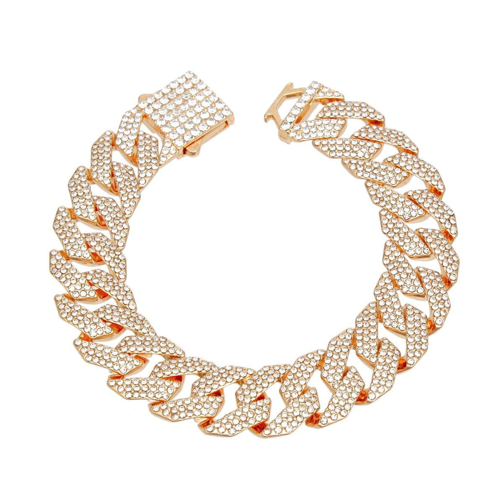 Overhead flat lay of a wide 14mm fully pave clear rhinestone Miami Cuban chain link bracelet arranged in a circle on a white background. A square push-lock box clasp fully covered in clear rhinestones is visible at the top with a safety latch closure in gold tone metal.