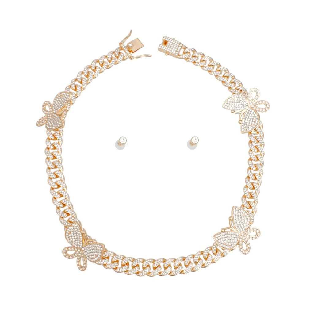 Gold rhinestone butterfly Cuban chain necklace set with matching small pearl stud earrings, flat lay on white background, push-lock clasp open