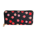 Black woven zipper wallet wristlet with allover red, pink, and mauve apple print on textured dark woven fabric, gold-tone zipper hardware — flat front view