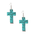 Pair of turquoise marbled acrylic cross drop earrings with dark veining, silver-tone fish-hook closures, and silver-tone accents on a white background.