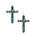 Pair of gold-tone cross drop earrings set with emerald-green round, square, rectangular, oval, and teardrop crystals on white